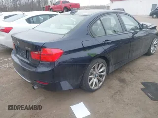 2013 BMW 3 Series 335i xDrive with VIN WBA3B9C50DJ899068, listed as a IAAI auction lot 41331622 with 156,216 mi miles. Bid and sale history available at carsss.com. Image 4.