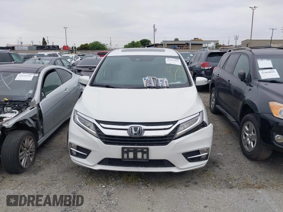 2020 Honda Odyssey Touring with VIN 5FNRL6H81LB028083, listed as a IAAI auction lot 42003810 with 71,536 mi miles and . Bid and sale history available at DreamBid. Image 12.