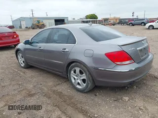 2006 Acura RL z VIN JH4KB16526C006190, wystawiony jako IAAI lot #42351400 z przebiegiem 150 749 mil mil oraz . Historia ofert i sprzedaży dostępna na DreamBid. Obrazek 3.