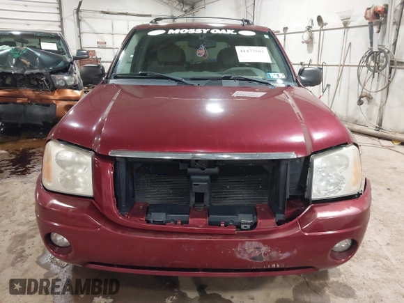 2006 GMC Envoy SLT with VIN 1GKDS13S362135683, listed as a IAAI auction lot 41477501 with 214,760 mi miles. Bid and sale history available at carsss.com. Image 12.