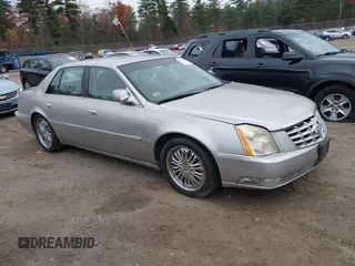 2007 Cadillac DTS Luxury I with VIN 1G6KD57Y07U168152, listed as a IAAI auction lot 40663548 with 154,000 mi miles and . Bid and sale history available at DreamBid. Image 1.