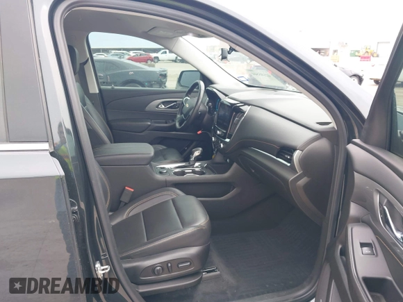 2021 Chevrolet Traverse LT with VIN 1GNERHKW4MJ191814, listed as a IAAI auction lot 42185544 with 87,493 mi miles and . Bid and sale history available at DreamBid. Image 5.