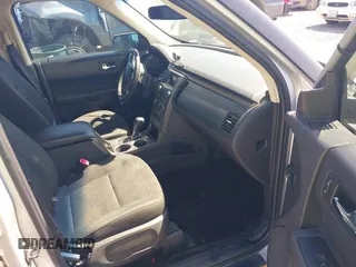 2014 Ford Flex SE z VIN 2FMGK5B85EBD33594, wystawiony jako IAAI lot #42015065 z przebiegiem 171 178 mil mil oraz . Historia ofert i sprzedaży dostępna na DreamBid. Obrazek 5.