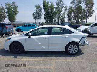 2024 Toyota Corolla Hybrid LE with VIN JTDBCMFE3RJ037223, listed as a IAAI auction lot 41978962 with 7,582 mi miles. Bid and sale history available at carsss.com. Image 15.