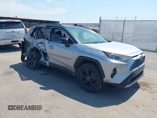 2019 Toyota RAV4 Hybrid XSE with VIN JTMEWRFV4KJ019580, listed as a IAAI auction lot 42048231 with 132,536 mi miles and . Bid and sale history available at DreamBid. Image 1.