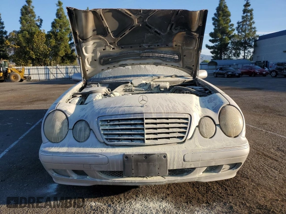 2002 Mercedes-Benz E-Class with VIN WDBJF65J32B496411, listed as a Copart auction lot 75690884 with 128,855 mi miles and Salvage Title. Bid and sale history available at carsss.com. Image 5.