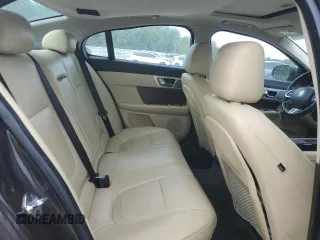 2013 Jaguar XF I4 RWD with VIN SAJWA0ES9DPU02213, listed as a Copart auction lot 69713934 with 104,088 mi miles and Salvage Title. Bid and sale history available at carsss.com. Image 10.