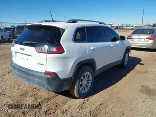 2019 Jeep Cherokee Latitude with VIN 1C4PJMCB2KD352024, listed as a IAAI auction lot 40868796 with 96,854 mi miles and . Bid and sale history available at DreamBid. Image 4.