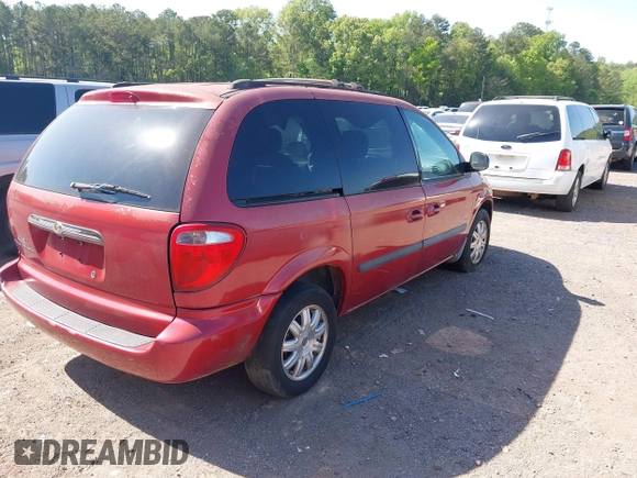 2006 Chrysler Town & Country SWB with VIN 1A4GP45R76B572053, listed as a IAAI auction lot 42015562 with 310,509 mi miles. Bid and sale history available at carsss.com. Image 4.