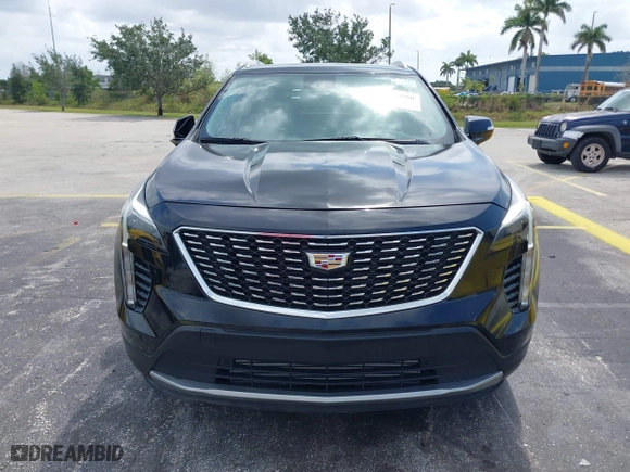 2023 Cadillac XT4 FWD Premium Luxury with VIN 1GYFZCR44PF170452, listed as a IAAI auction lot 42084960 with 22,212 mi miles. Bid and sale history available at carsss.com. Image 6.