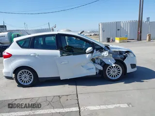 2015 Ford C-Max SE z VIN 1FADP5AU9FL107556, wystawiony jako IAAI lot #42403359 z przebiegiem 208 129 mil mil oraz . Historia ofert i sprzedaży dostępna na DreamBid. Obrazek 13.