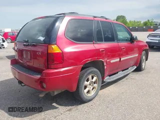 2002 GMC Envoy SLT z VIN 1GKDT13S922268682, wystawiony jako IAAI lot #42348610 z przebiegiem 191 745 mil mil oraz . Historia ofert i sprzedaży dostępna na DreamBid. Obrazek 4.