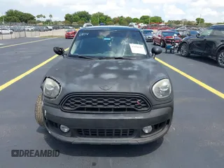 2018 MINI Countryman Cooper S z VIN WMZYT3C35J3E00804, wystawiony jako IAAI lot #42194381 z przebiegiem 101 634 mil mil oraz . Historia ofert i sprzedaży dostępna na DreamBid. Obrazek 12.