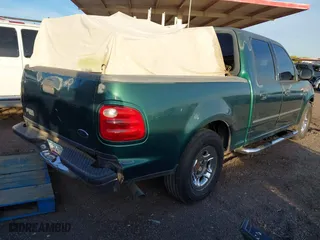 2001 Ford F-150 SuperCrew XLT with VIN 1FTRW07W81KD64706, listed as a IAAI auction lot 41939548 with 1 mi miles. Bid and sale history available at carsss.com. Image 4.