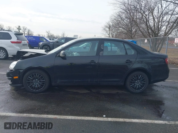 2008 Volkswagen Jetta Sedan S with VIN 3VWJZ71K18M046235, listed as a IAAI auction lot 41477069 with 123,607 mi miles. Bid and sale history available at carsss.com. Image 14.
