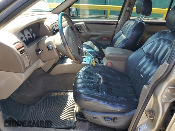 2001 Jeep Grand Cherokee Limited with VIN 1J4GW58NX1C676170, listed as a Copart auction lot 52363495 with 213,678 mi miles and Clean Title. Bid and sale history available at carsss.com. Image 7.