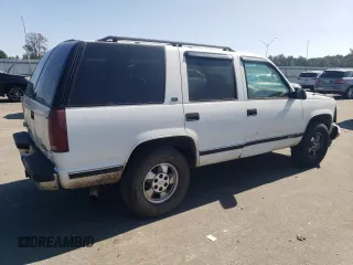 1996 GMC Yukon with VIN 1GKEK13R1TJ750705, listed as a Copart auction lot 76251474 with 245,084 mi miles and Salvage Title. Bid and sale history available at carsss.com. Image 3.