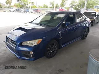 2015 Subaru WRX with VIN JF1VA1A60F9833285, listed as a IAAI auction lot 42127612 with 100,035 mi miles and . Bid and sale history available at DreamBid. Image 2.