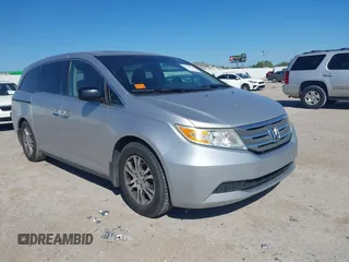 2011 Honda Odyssey EX-L with VIN 5FNRL5H67BB070040, listed as a IAAI auction lot 42814975 with 236,517 mi miles and . Bid and sale history available at DreamBid. Image 1.