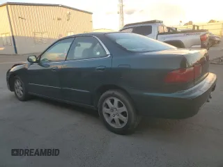 1999 Acura Integra with VIN JH4DB7665XS000928, listed as a Copart auction lot 80924344 with 198,981 mi miles and Salvage title. Bid and sale history available at DreamBid. Image 2.