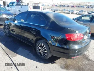 2012 Volkswagen Jetta Sedan SEL w/Sunroof with VIN 3VWLX7AJ1CM376990, listed as a IAAI auction lot 41206594 with 50,906 mi miles. Bid and sale history available at carsss.com. Image 14.