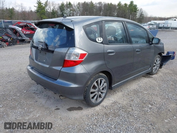 2013 Honda Fit Sport with VIN JHMGE8H54DC060946, listed as a IAAI auction lot 42095655 with 117,729 mi miles. Bid and sale history available at carsss.com. Image 4.