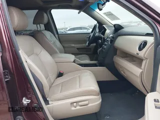 2012 Honda Pilot EX-L with VIN 5FNYF3H56CB018706, listed as a IAAI auction lot 41694870 with 243,284 mi miles. Bid and sale history available at carsss.com. Image 5.