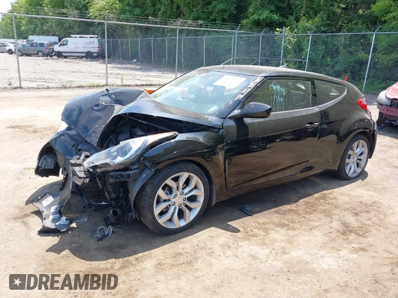 2013 Hyundai Veloster w/Black Int with VIN KMHTC6AD5DU164900, listed as a IAAI auction lot 36770576 with 106,253 mi miles and . Bid and sale history available at DreamBid. Image 2.