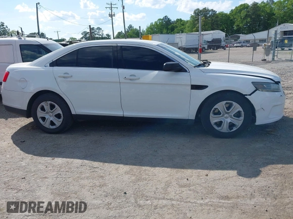 2015 Ford Police Interceptor z VIN 1FAHP2MK7FG203950, wystawiony jako IAAI lot #42182617 z przebiegiem 165 426 mil mil oraz . Historia ofert i sprzedaży dostępna na DreamBid. Obrazek 13.