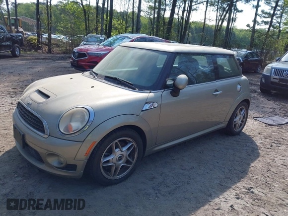 2010 MINI Hardtop S with VIN WMWMF7C58ATX45365, listed as a IAAI auction lot 42035404 with 26,393 mi miles and . Bid and sale history available at DreamBid. Image 2.