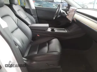 2022 Tesla Model Y Long Range with VIN 7SAYGAEE9NF384400, listed as a Copart auction lot 51961545 with 31,758 mi miles and Salvage Title. Bid and sale history available at DreamBid. Image 7.