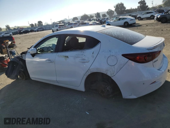 2015 Mazda 3 S Touring with VIN JM1BM1V37F1221443, listed as a Copart auction lot 88286695 with Not Provided miles and Salvage Title. Bid and sale history available at DreamBid. Image 2.