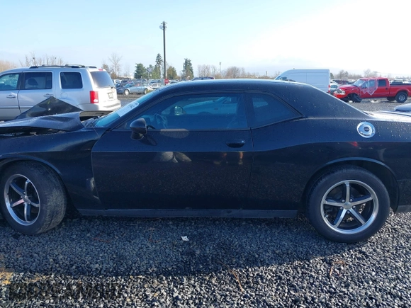 2011 Dodge Challenger z VIN 2B3CJ4DG2BH569764, wystawiony jako IAAI lot #41652462 z przebiegiem 138 057 mil mil oraz . Historia ofert i sprzedaży dostępna na DreamBid. Obrazek 15.