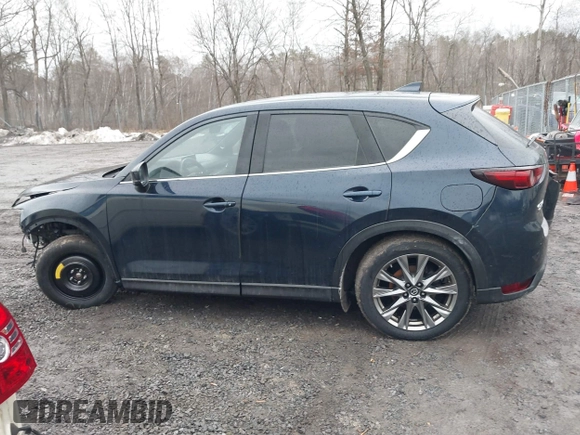 2019 Mazda CX-5 Signature with VIN JM3KFBEY4K0525171, listed as a IAAI auction lot 41706635 with 88,293 mi miles. Bid and sale history available at carsss.com. Image 14.