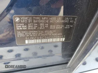 2012 BMW X5 35i with VIN 5UXZV4C56CL754643, listed as a Copart auction lot 55970125 with 150,584 mi miles and Salvage title. Bid and sale history available at DreamBid. Image 12.