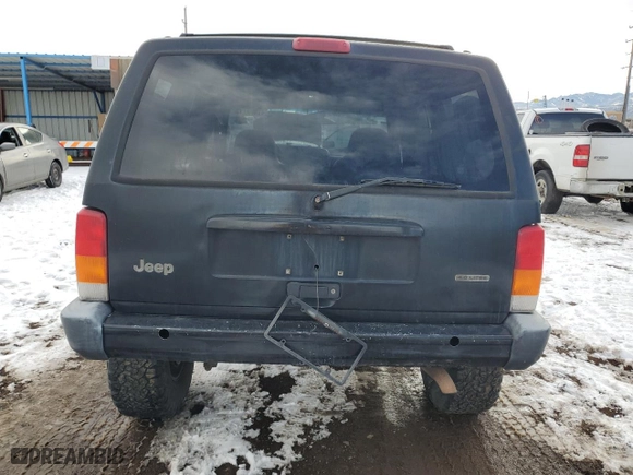 2000 Jeep Cherokee Police with VIN 1J4FF48S9YL205293, listed as a Copart auction lot 41903715 with 307,918 mi miles and Salvage Title. Bid and sale history available at carsss.com. Image 6.