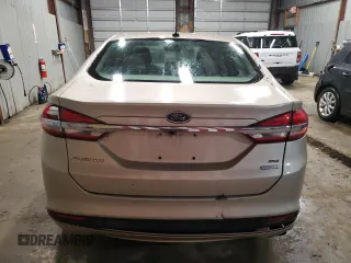 2017 Ford Fusion SE z VIN 3FA6P0HD0HR120234, wystawiony jako Copart lot #41964305 z przebiegiem 114 200 mil mil oraz Czysty tytuł • Clean title. Historia ofert i sprzedaży dostępna na DreamBid. Obrazek 6.
