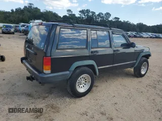 1997 Jeep Cherokee SE with VIN 1J4FJ28S6VL563756, listed as a Copart auction lot 74795074 with 196,118 mi miles and Salvage Title. Bid and sale history available at carsss.com. Image 3.
