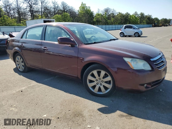2006 Toyota Avalon XL z VIN 4T1BK36B06U100612, wystawiony jako Copart lot #58471365 z przebiegiem 148 853 mil mil oraz Czysty tytuł • Clean title. Historia ofert i sprzedaży dostępna na DreamBid. Obrazek 4.