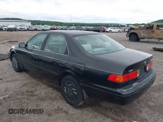 2001 Toyota Camry CE z VIN 4T1BG22K81U054795, wystawiony jako IAAI lot #42359932 z przebiegiem 167 341 mil mil oraz . Historia ofert i sprzedaży dostępna na DreamBid. Obrazek 3.