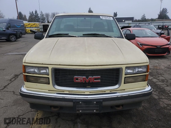 1997 GMC Sierra 1500 with VIN 1GTGC24R4VZ546832, listed as a Copart auction lot 87954535 with 411,941 mi miles and Clean Title. Bid and sale history available at DreamBid. Image 5.