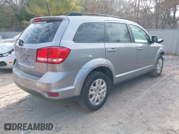 2019 Dodge Journey SE with VIN 3C4PDCBB0KT719211, listed as a IAAI auction lot 41823499 with 151,569 mi miles and . Bid and sale history available at DreamBid. Image 4.