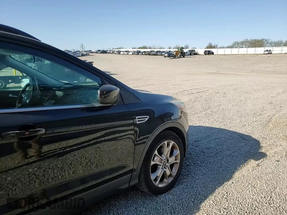 2014 Ford Escape SE with VIN 1FMCU0GX7EUB42975, listed as a Copart auction lot 52605765 with 138,523 mi miles and Salvage Title. Bid and sale history available at DreamBid. Image 12.