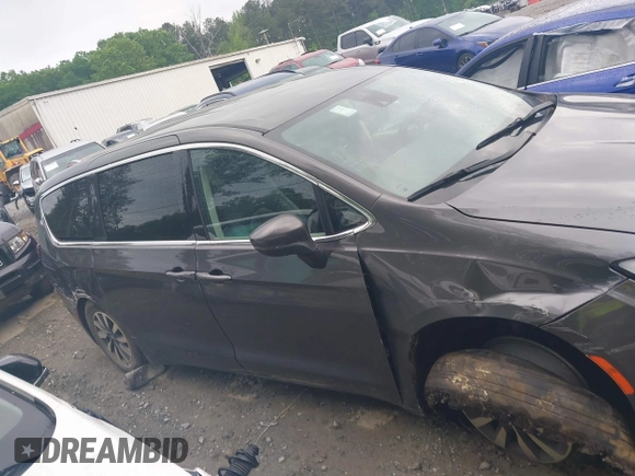 2023 Chrysler Pacifica Hybrid Touring L with VIN 2C4RC1L72PR540902, listed as a IAAI auction lot 42151047 with Not Provided miles and . Bid and sale history available at DreamBid. Image 12.