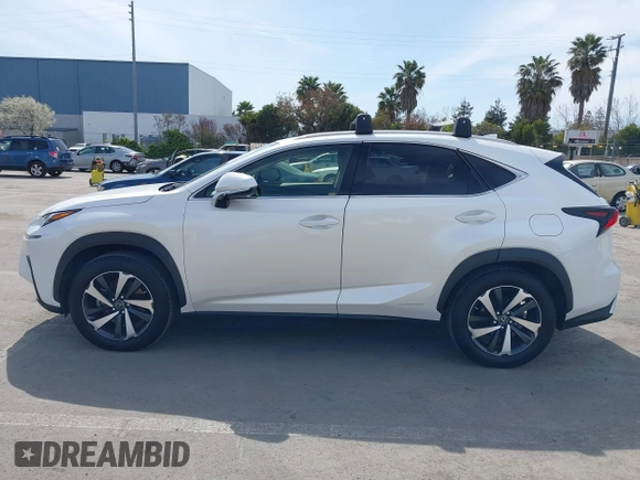 2021 Lexus NX 300h with VIN JTJGJRDZ2M5012553, listed as a IAAI auction lot 41850243 with 56,737 mi miles and . Bid and sale history available at DreamBid. Image 14.
