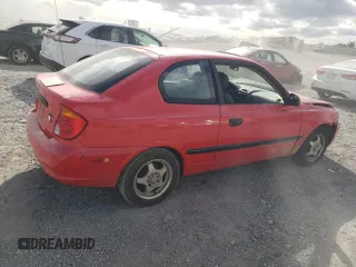2003 Hyundai Accent with VIN KMHCF35C33U255489, listed as a Copart auction lot 75490604 with 219,457 mi miles and Salvage Title. Bid and sale history available at carsss.com. Image 3.