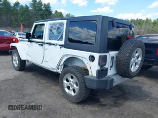 2015 Jeep Wrangler Unlimited Sahara with VIN 1C4HJWEG6FL556460, listed as a IAAI auction lot 42066648 with 54,747 mi miles. Bid and sale history available at carsss.com. Image 3.