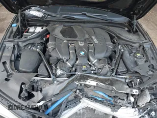 2018 BMW 5 Series M550i xDrive with VIN WBAJB9C51JB035949, listed as a IAAI auction lot 42085727 with Not provided miles and . Bid and sale history available at DreamBid. Image 10.