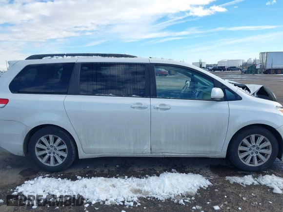 2011 Toyota Sienna XLE AAS with VIN 5TDYK3DC8BS045352, listed as a IAAI auction lot 41401955 with 142,492 mi miles and . Bid and sale history available at DreamBid. Image 13.