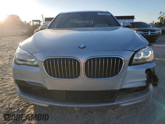 2015 BMW 7 Series 750i with VIN WBAYA8C53FGK19778, listed as a Copart auction lot 77258684 with 34,535 mi miles and Salvage title. Bid and sale history available at DreamBid. Image 5.